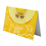 Custom printed beach party invitation card by PGI Printing, featuring yellow and white summer-themed design with hat, sunglasses, and event details.